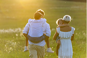 Rear view of family with two kids on, a Person Photo by HalfPoint