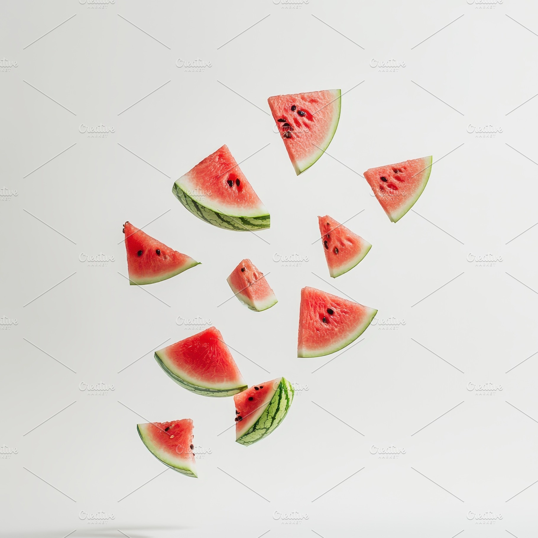 Juicy Watermelon Slices Falling Whit, a Food & Drink Photo by Pixeness Studio