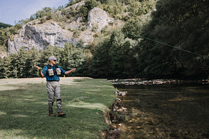 Fly fishing stock photo containing man and fly