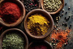 Spices in wooden bowls, a Photo by Beautiful things