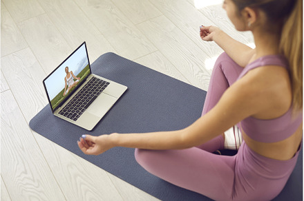Woman watching video lesson on, a Technology Photo by StudioRomantic
