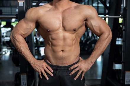Male Bodybuilder Flexing His Muscle