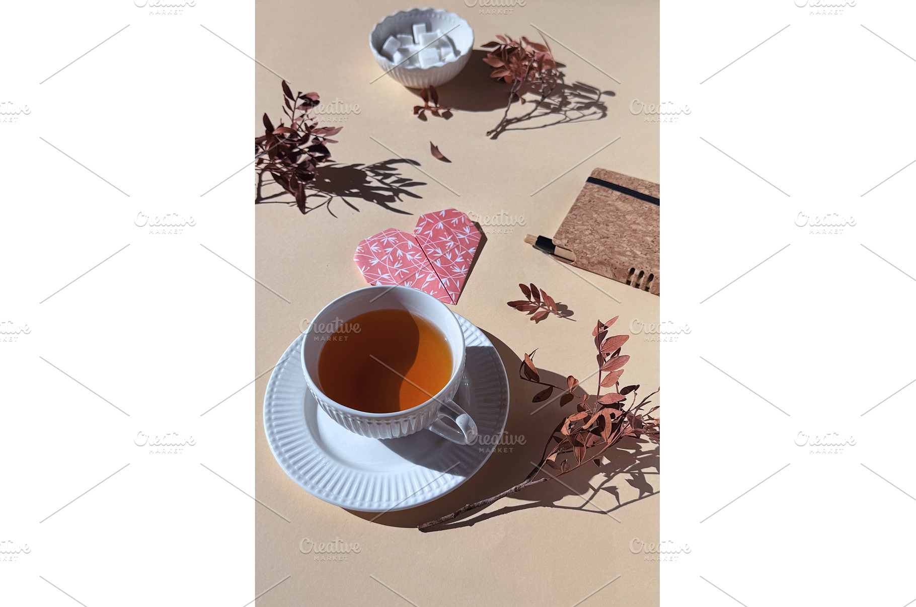 Cup of tea with origami heart, sugar, a Photo by tilialucida
