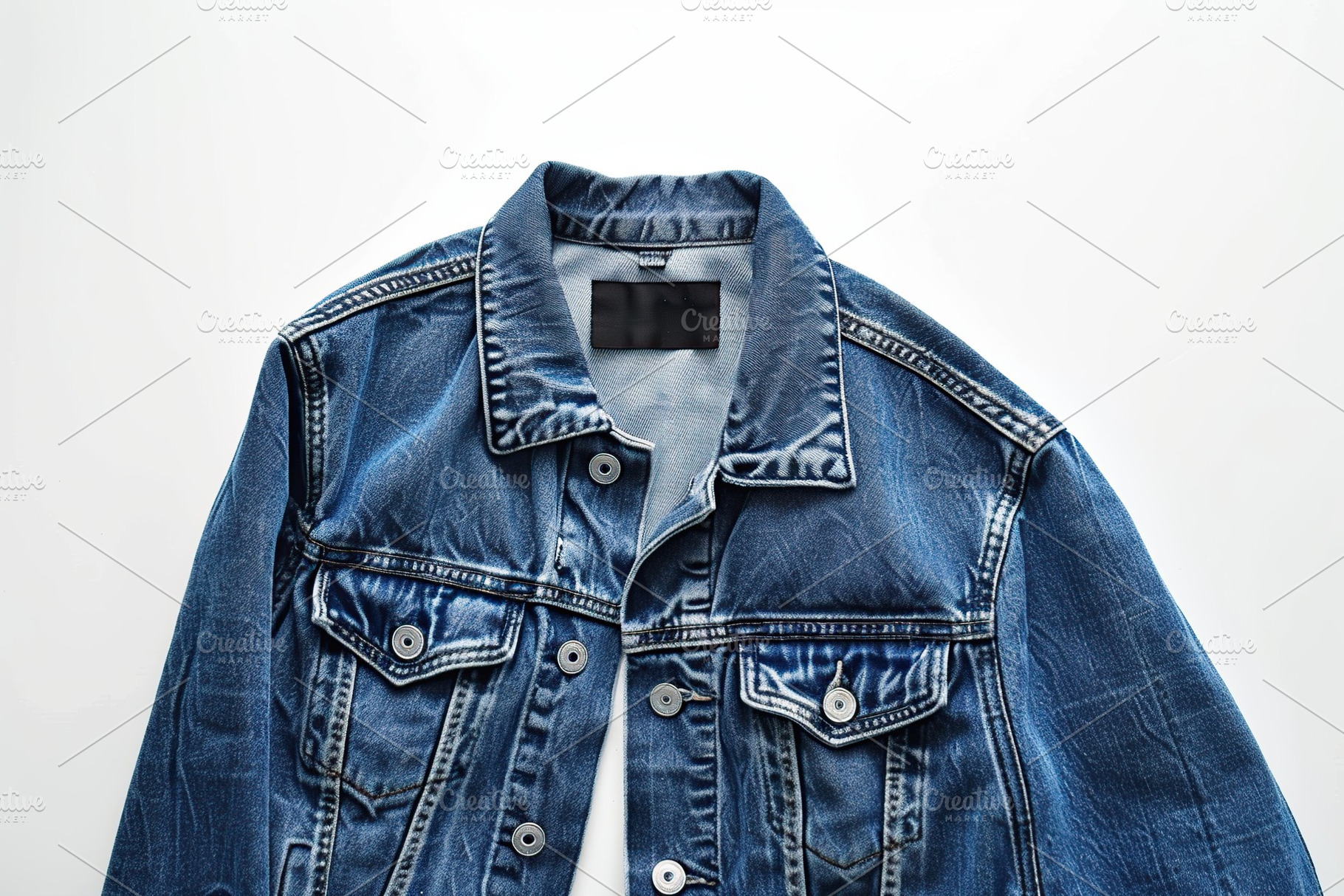 Blue denim jacket on white background, a Beauty & Fashion Photo by AlyaAnd
