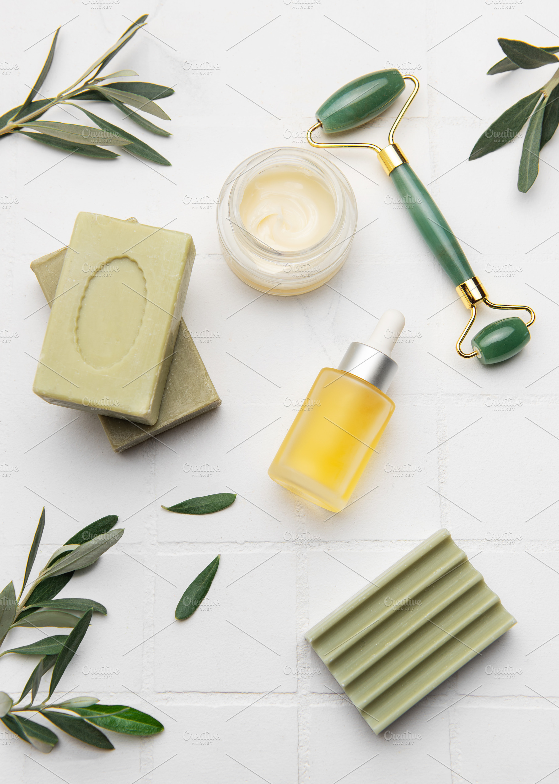 Natural olive oil soap, cream, serum and green jade roller creat, a Health & Medical Photo by Olena Rudo