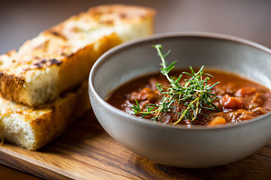 Rich tomato stew with fresh thyme, a Food & Drink Photo by MistyDay