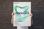 Man Holding Poster 2 Mock-up, a Print Template by Branda Keeps (Thumbnail 4 of 16)