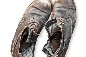 Pair of old boots isolated, a Beauty & Fashion Photo by BOOCYS