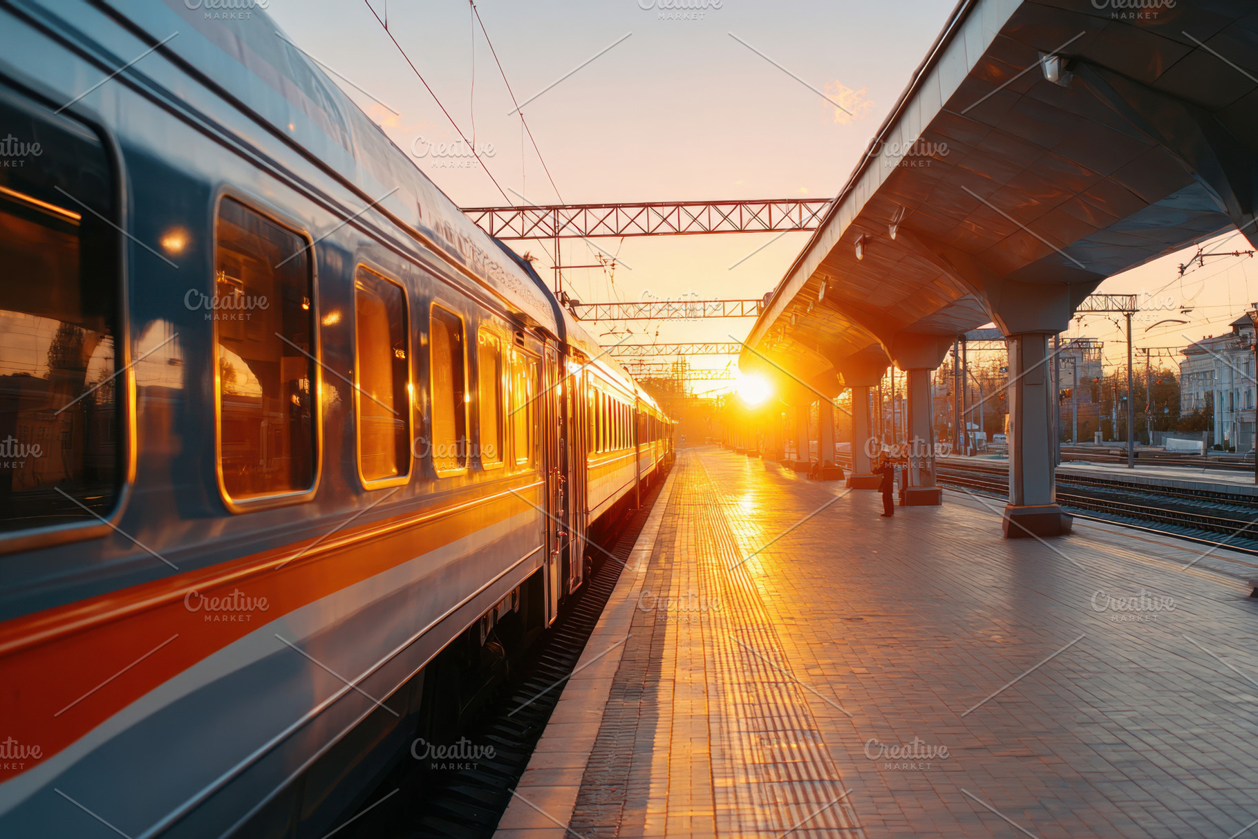 Train at sunset on a platform, a Transportation Photo by AlyaAnd