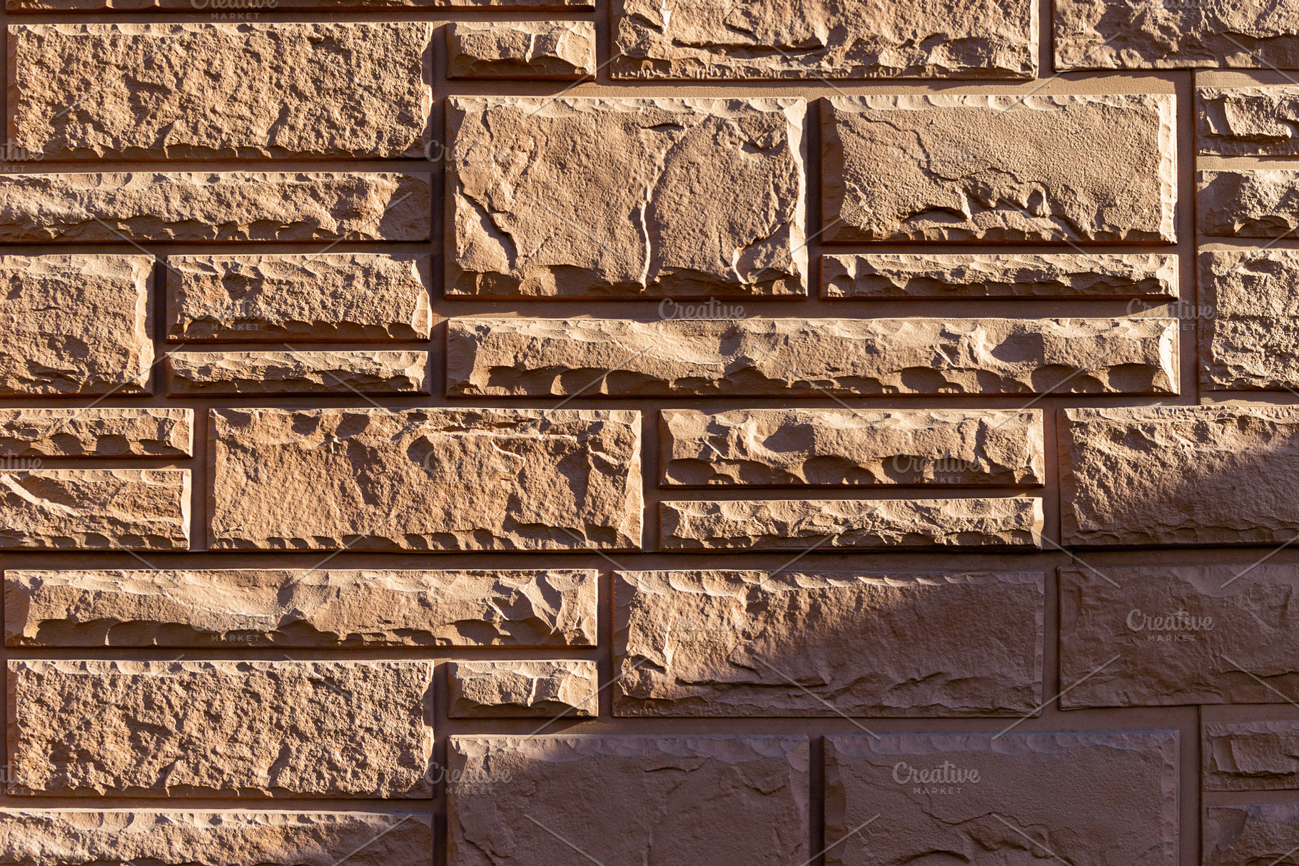 Close-up of a decorative stone brick, an Architecture Photo by Edalin's Store