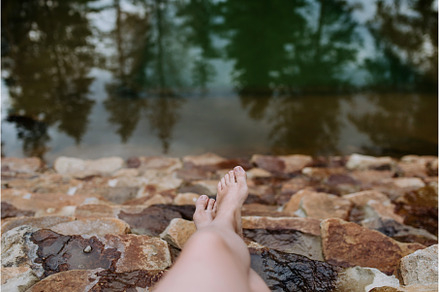 Young woman legs on stone stairs in, a Nature Photo by HalfPoint