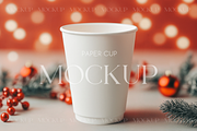 Holiday Cup Mock with Bokeh Lights, a Product Mockup by MockupWizard (Thumbnail 1 of 3)