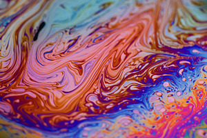 Defocused iridescent soap colorful ink blob circle, a Background Photo by Photo Drive Studio