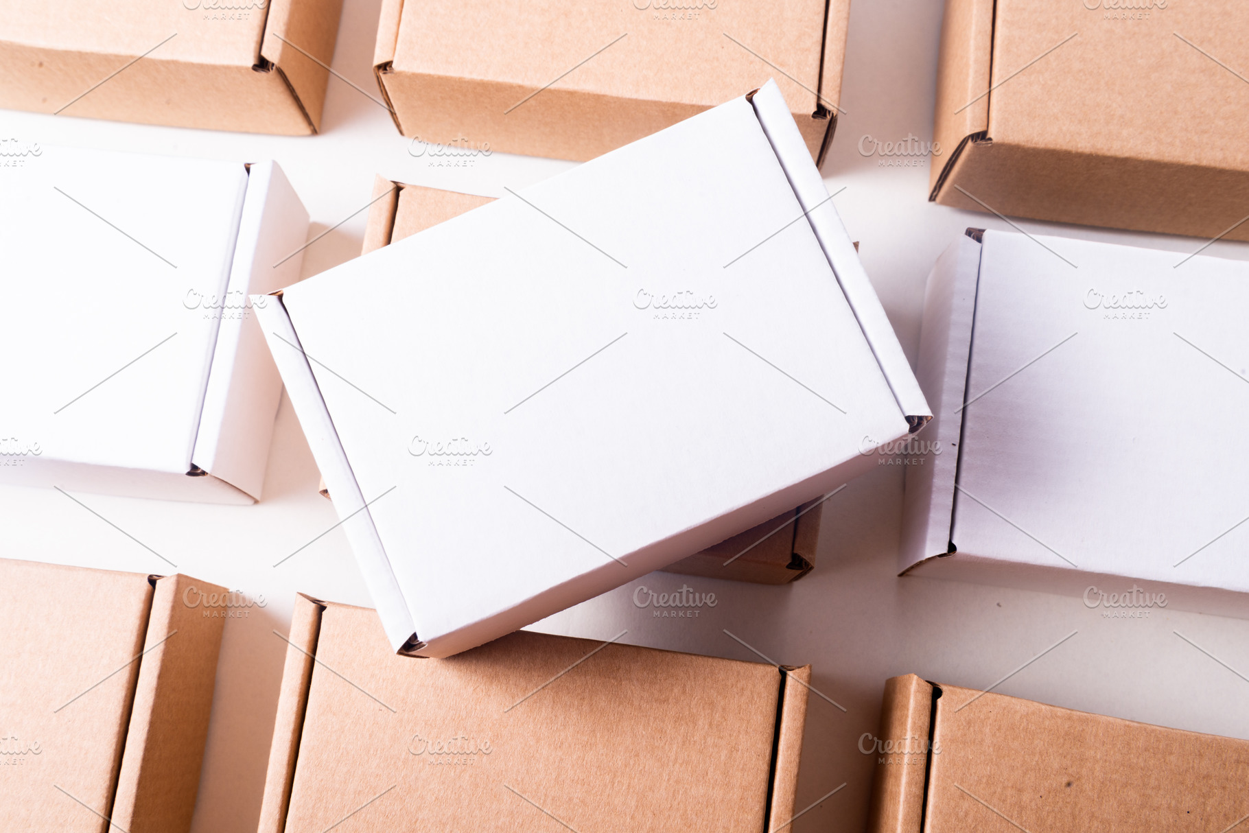 Lot of cardboard box, brown and white, mockup, a Photo by MDBildes