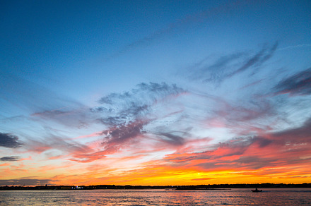 Ocean city stock photo containing sunrise and surfer