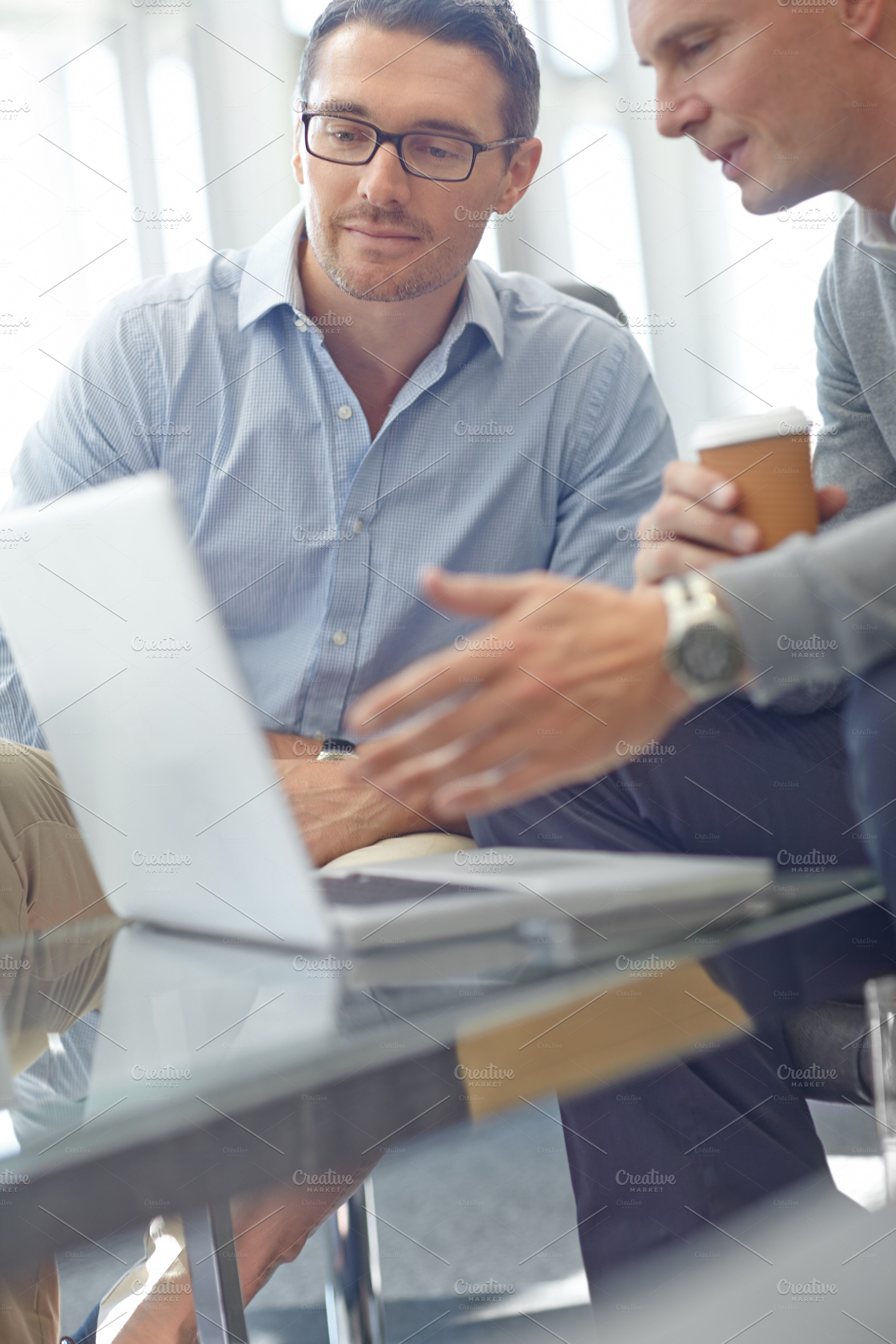 Planning their future business endeavours, a Photo by Peopleimages.com