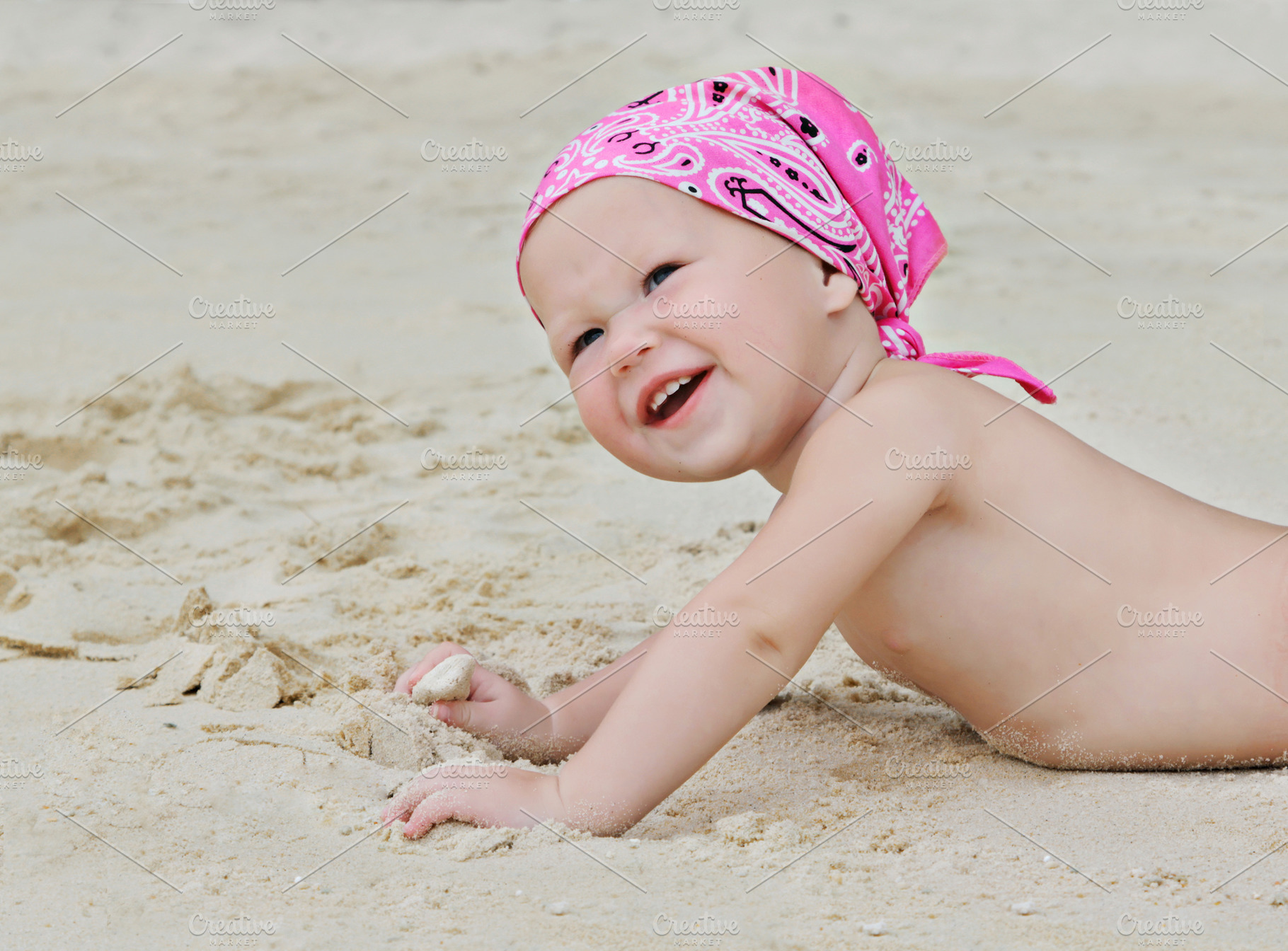 Baby on the beach, a Photo by saiko3p