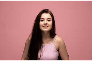Young woman confidently smiling, a Person Photo by volodymyrshtun13795
