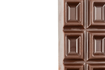 Chocolate bar isolated on white back, a Food & Drink Photo by AlexBush