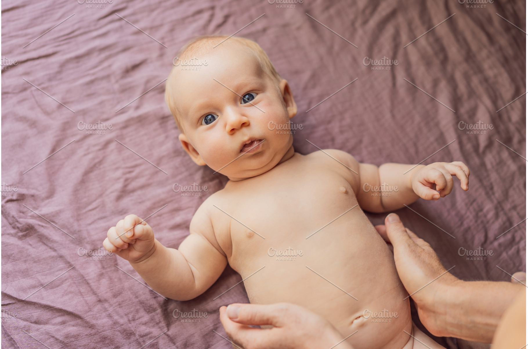 Newborn baby lying on a soft blanket, a Sports & Recreation Photo by Elizaveta Galitskaya