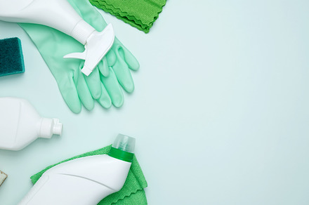 Concept of cleanliness and hygiene. Cleaning supplies and tools, including bott, a Photo by matucha