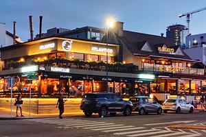 Restaurant zone near port night urban scene, punta del este urug, a Person Photo by DanFLCreativo