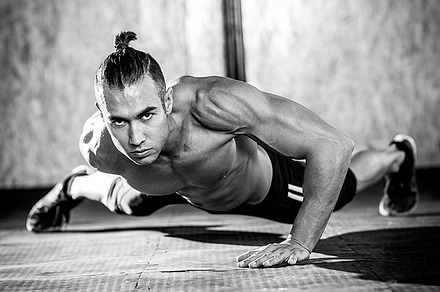 Showing his muscles stock photo containing gym and man, a Sports & Recreation Photo by Mexico stock images