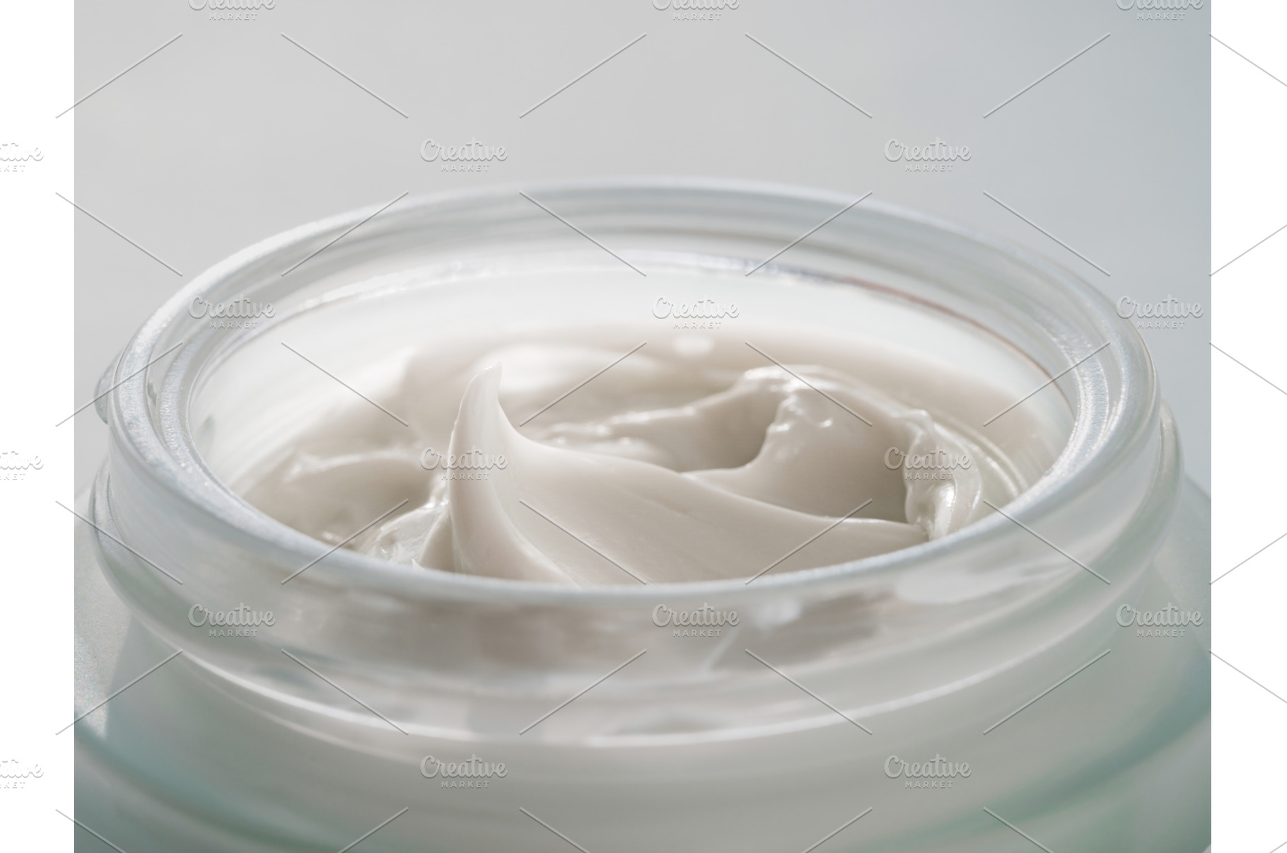 Open glasss jar with cosmetic cream, a Beauty & Fashion Photo by Fascinadora
