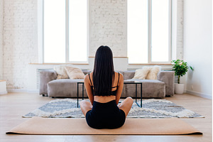 Rear view of a female meditating and, a Sports & Recreation Photo by undrey