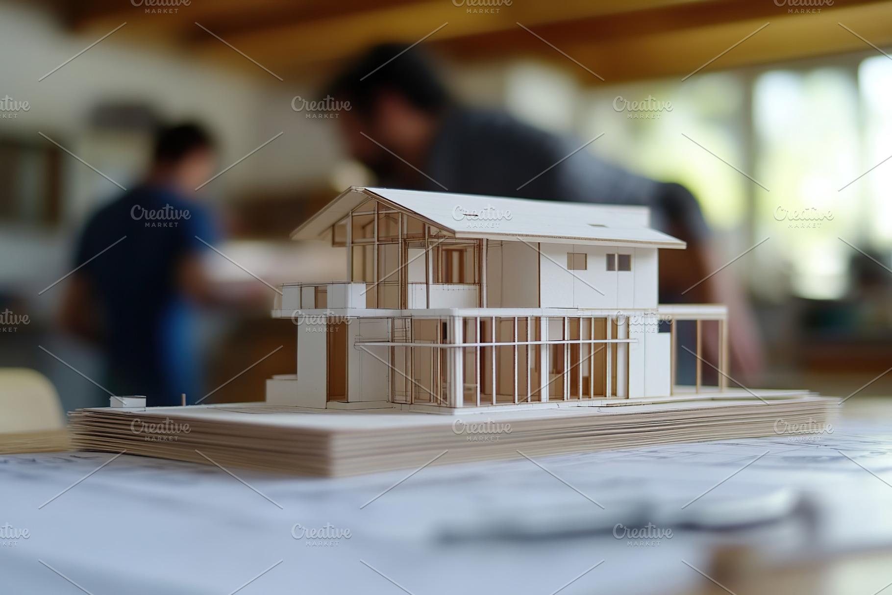 Architecture team working on house model building, an Architecture Photo by AlyaAnd