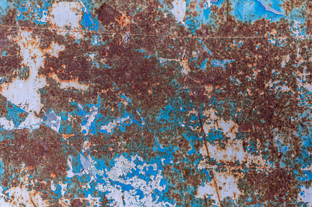 Weathered metal surface with blue paint, peeling layers, and ext, a Background Photo by Ales Munt