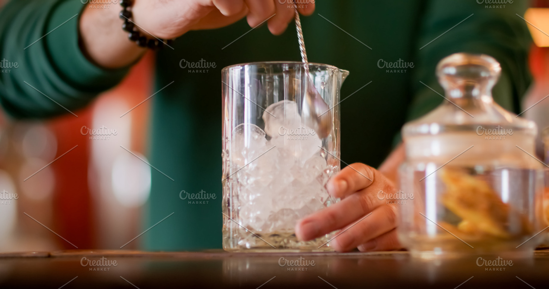 Stirring ice cocktail cube glass, a Food & Drink Photo by Photo Drive Studio