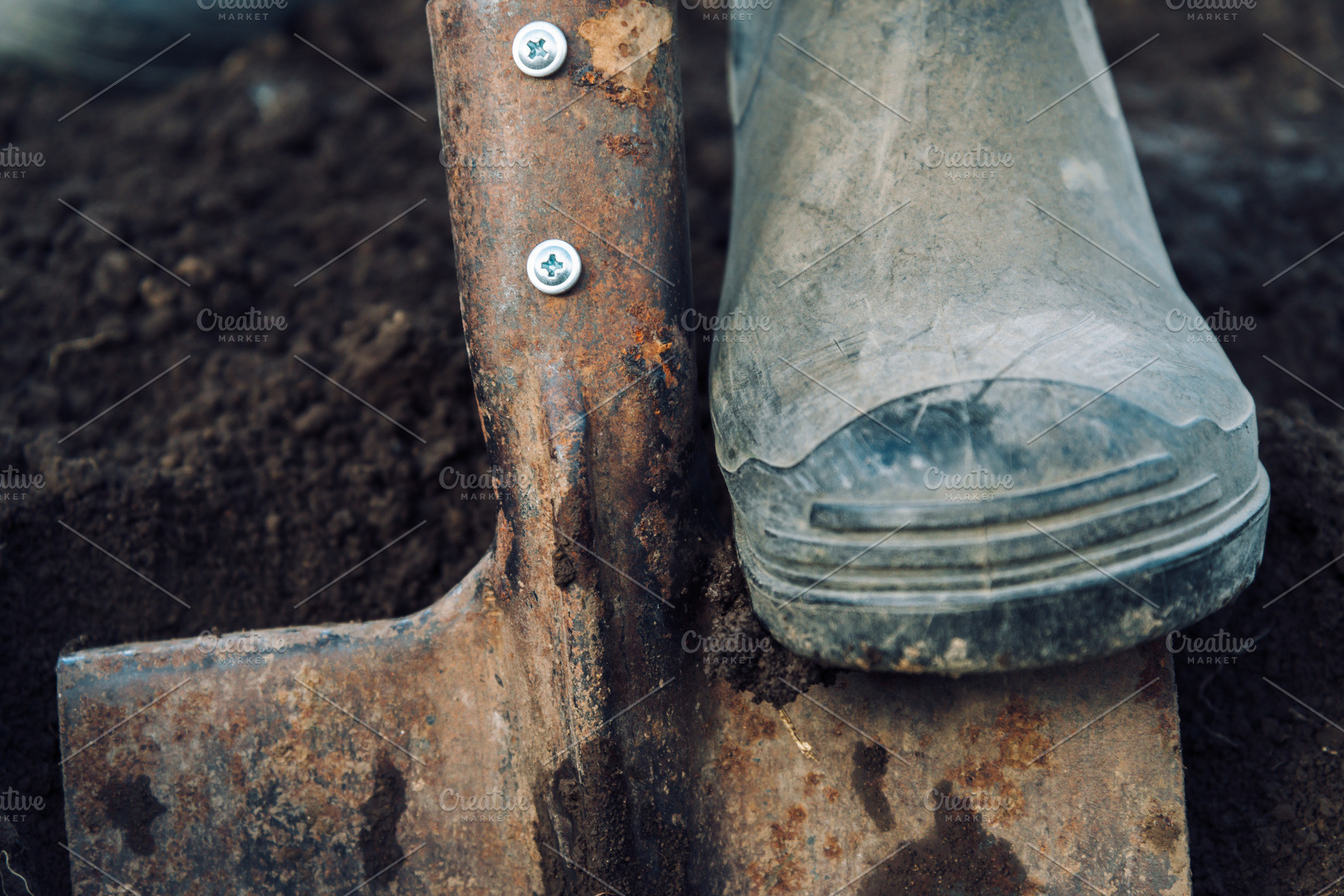 Man digs on garden, an Industrial Photo by P&G