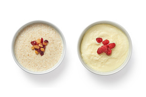 Two portions of oatmeal porridge for, a Food & Drink Photo by Yaroslav Danylchenko