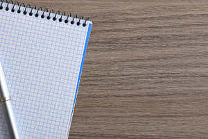 Blank Notebook with Pen on Wooden Desk, a Business Photo by Davizro's Market