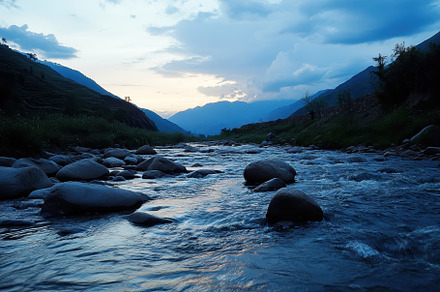 Evening serenity along a rocky river, a Photo by Iftikhar Alam