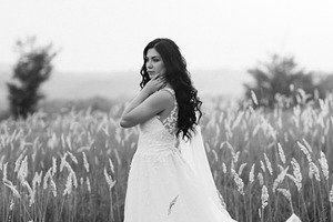 girl are walking in the green hills, a Person Photo by Weddings, People, Travel