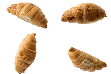 baked croissant isolated on white background, a Food & Drink Photo by ndanko
