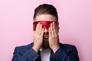 Businessman in Red Blindfold, a Person Photo by Ales Munt
