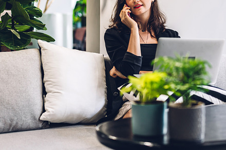 Portrait of smiling happy beautiful woman relax using technology, a Person Photo by Art_Photo