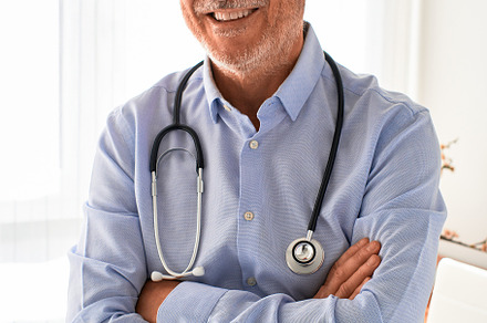 Portrait of mature doctor smiling an