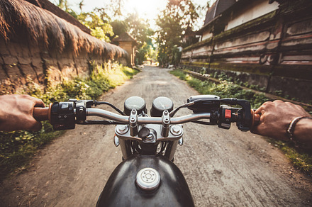 Biker driving his motorcycle, a Person Photo by Jacob Lund