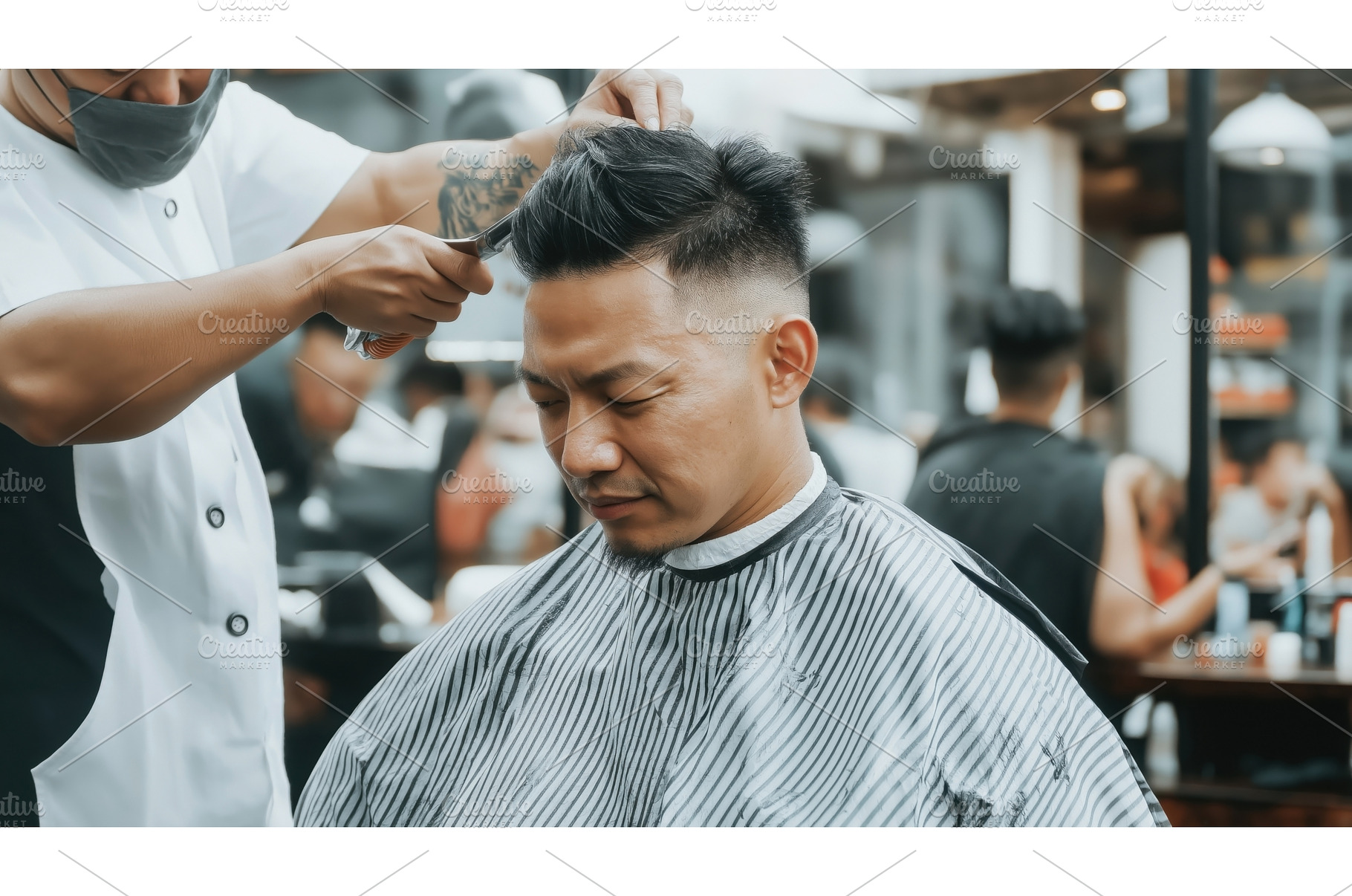 Asian man receiving a haircut from a, a Person Photo by Sergey Kotenev