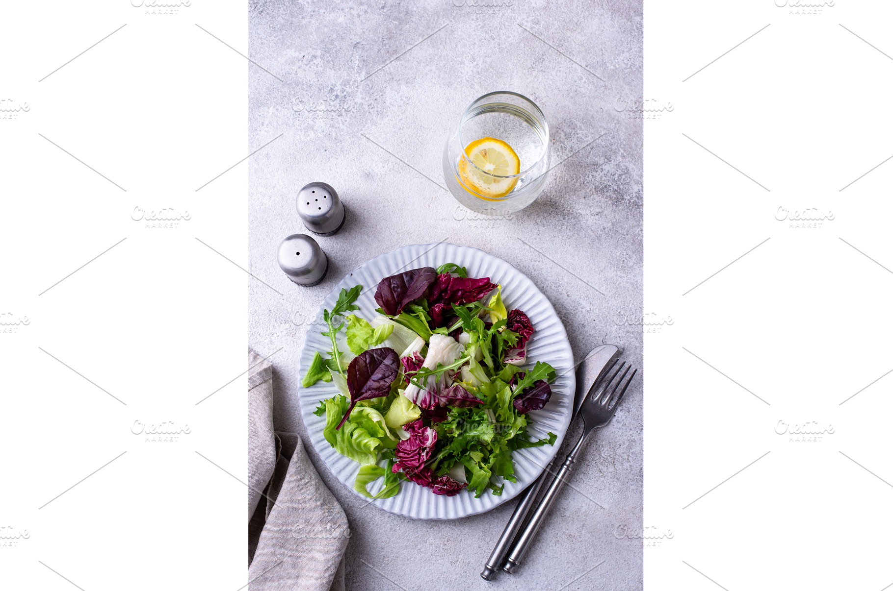 Bowl of fresh green salad mix, a Food & Drink Photo by Yulia Furman