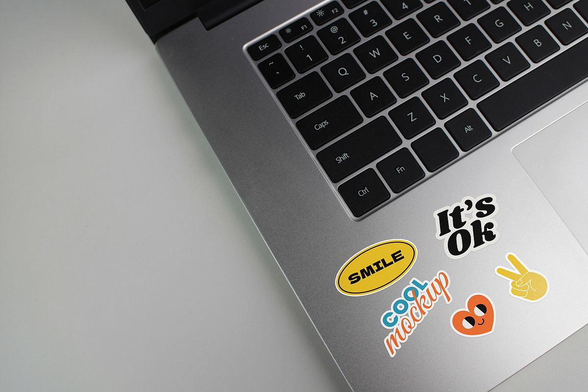 Laptop with Stickers Creation Mockup, a Mockup by Luuqas Design (Photo 3 of 12)