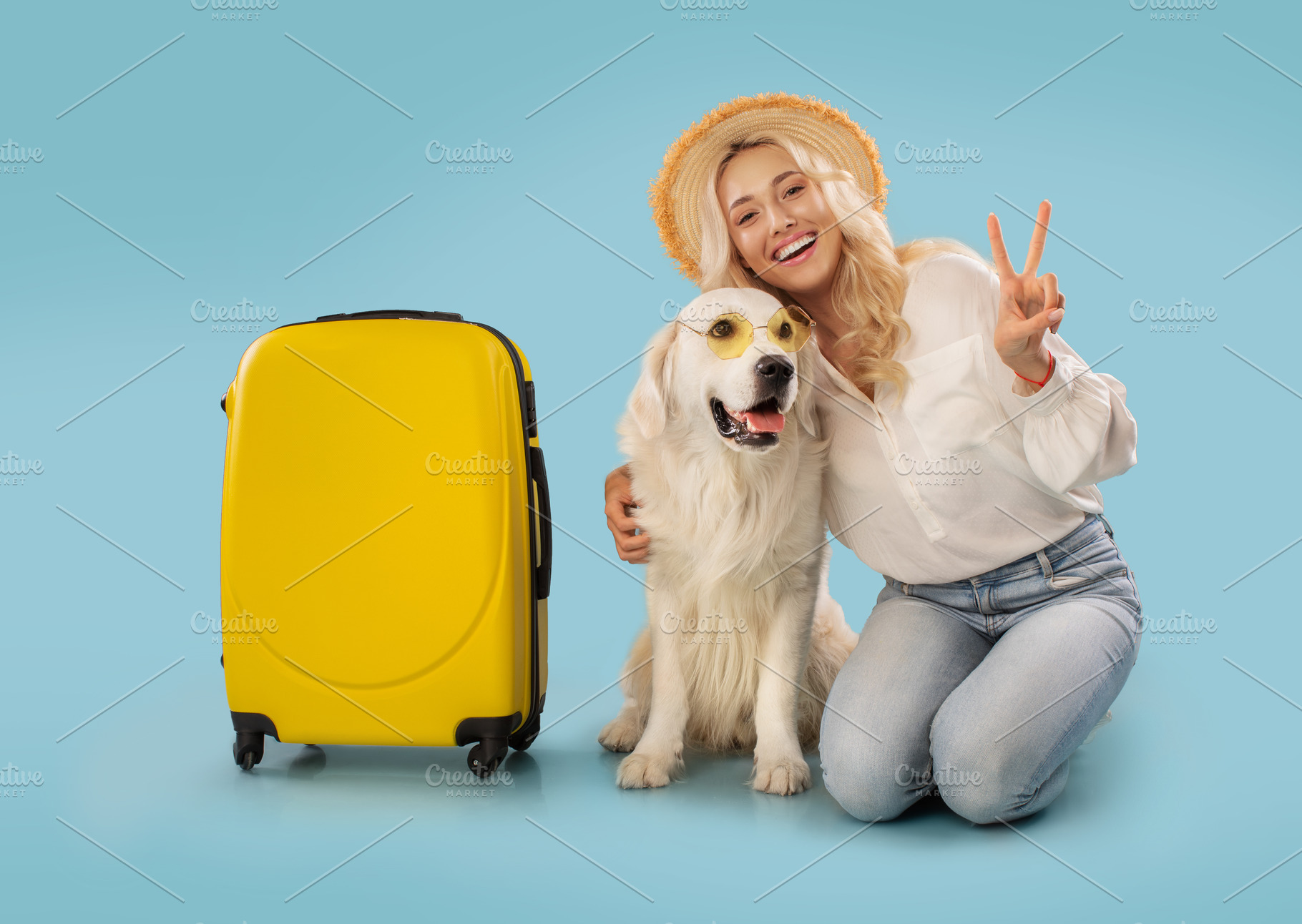 Portrait of happy lady in summer hat hugging dog in colorful sunglasses, sittin, a Photo by Prostock-Studio