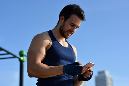 Athlete practicing exercises stock photo containing mobile and phone, a Sports & Recreation Photo by expressiovisual