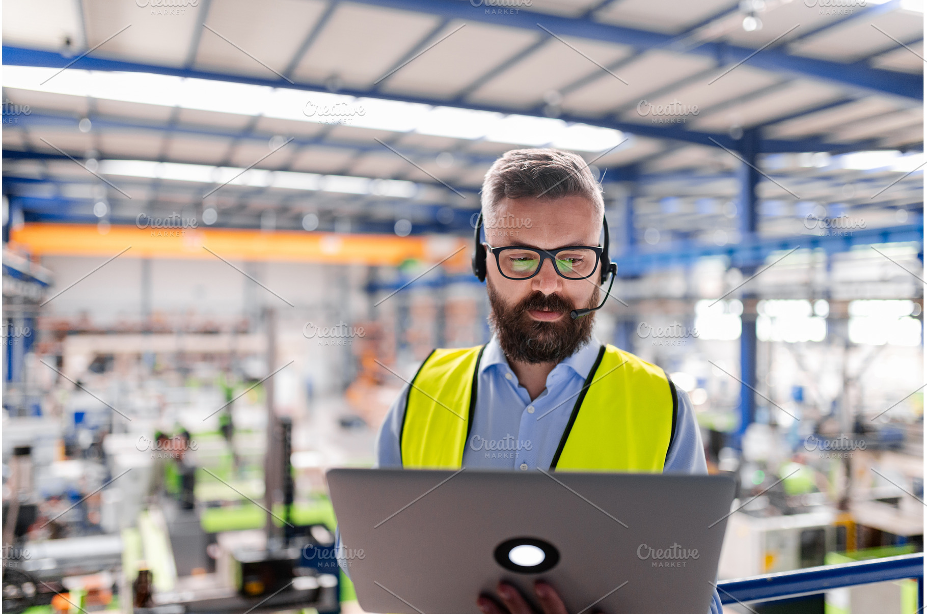 Quality manager with headset and, a Person Photo by HalfPoint