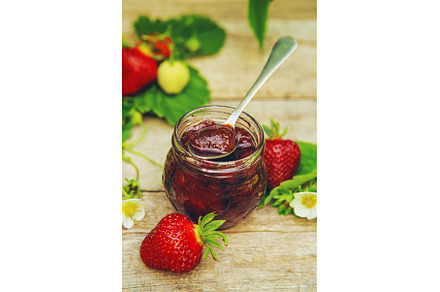 Homemade strawberry jam in a jar, a Food & Drink Photo by yanadjana