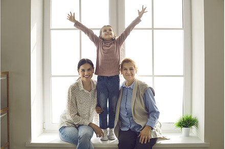 Older woman with her adult daughter, a Person Photo by StudioRomantic